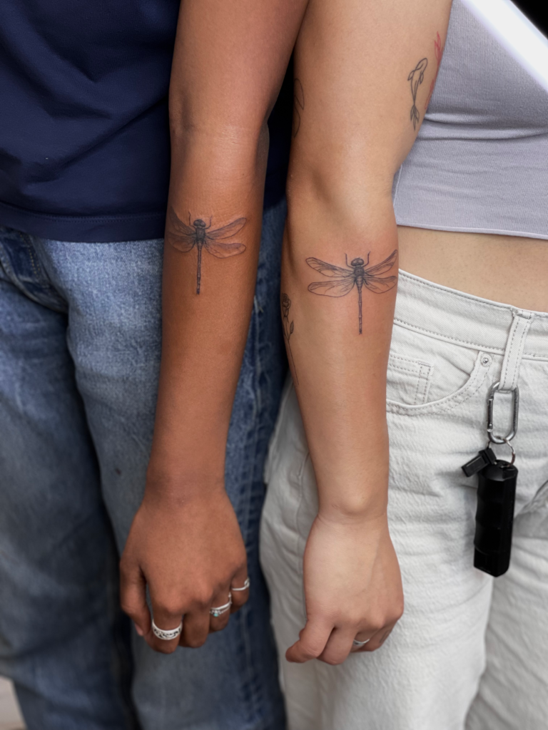 matching dragonfly tattoos